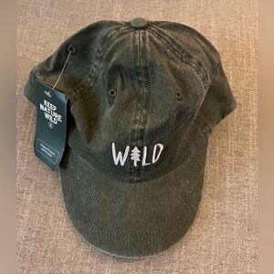 Never worn green hat with “wild” sewn on front